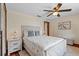 Comfortable bedroom featuring a queen bed, side tables, and neutral colors at 4301 S Lockwood Ridge Rd, Sarasota, FL 34231
