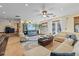 Bright and airy living room with comfortable seating and open access to the kitchen at 4301 S Lockwood Ridge Rd, Sarasota, FL 34231