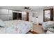 Spacious main bedroom with tiled floors, dresser and large wardrobe storage space at 4301 S Lockwood Ridge Rd, Sarasota, FL 34231