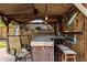 Covered outdoor bar with seating at 4301 S Lockwood Ridge Rd, Sarasota, FL 34231