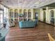 Inviting library with cozy seating, built-in bookshelves, and relaxing atmosphere for reading at 4550 Cove Cir # 1003, St Petersburg, FL 33708