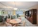 Comfortable living area with large windows and built-in shelving at 4550 Cove Cir # 1003, St Petersburg, FL 33708