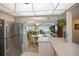 Open living space with dining area and a view from the kitchen at 4550 Cove Cir # 1003, St Petersburg, FL 33708