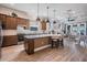Open concept kitchen with an island and stainless appliances, perfect for entertaining at 4620 Ballast Crest Cv, Land O Lakes, FL 34638