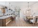 Bright, open-concept layout featuring a kitchen island and dining area for easy living at 4620 Ballast Crest Cv, Land O Lakes, FL 34638