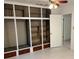 Bedroom featuring shelving with tile flooring at 5008 N Suwanee Ave, Tampa, FL 33603