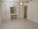 Main bedroom with closet and tile flooring at 5008 N Suwanee Ave, Tampa, FL 33603