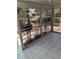 Enclosed patio featuring tile flooring and exterior view at 5008 N Suwanee Ave, Tampa, FL 33603