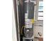 Rheem water heater in utility area at 5008 N Suwanee Ave, Tampa, FL 33603