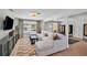 Bright living room with large window, comfortable seating, and stylish decor at 504 7Th Sw Ave, Largo, FL 33770