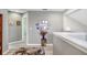 Bright hallway showcases decor and carpet on the second story of this lovely home at 5525 Turtle Crossing Loop, Tampa, FL 33625