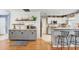 Modern kitchen with gray cabinets, stainless appliances, and breakfast bar at 5525 Turtle Crossing Loop, Tampa, FL 33625