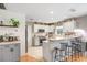 Bright kitchen featuring recessed lighting, white cabinets, and tile backsplash at 5525 Turtle Crossing Loop, Tampa, FL 33625