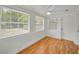 Bonus room offers natural light and hardwood floors at 5642 9Th N Ave, St Petersburg, FL 33710