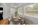 Dining room area with natural light and hardwood floors, perfect for Gathering meals at 5642 9Th N Ave, St Petersburg, FL 33710