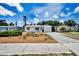 Lovely single-story home with a spacious driveway and a neatly maintained front lawn at 5642 9Th N Ave, St Petersburg, FL 33710