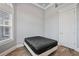 Bedroom with hardwood floors, a modern window, and a door at 602 Swilley Rd, Plant City, FL 33567