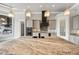 Expansive kitchen island with pendant lights, stainless appliances and pantry at 602 Swilley Rd, Plant City, FL 33567