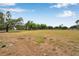 Beautiful, expansive property with well-maintained grass and mature trees offering both shade and privacy at 602 Swilley Rd, Plant City, FL 33567