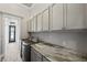 Well-organized laundry room with modern washer and dryer at 602 Swilley Rd, Plant City, FL 33567
