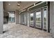 Covered patio area with doors and windows that provide plenty of natural light at 602 Swilley Rd, Plant City, FL 33567