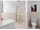 Clean bathroom with glass enclosed shower and large vanity at 6101 Willow Oak Cir, Bradenton, FL 34209