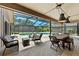 Covered patio overlooking a beautiful backyard pool at 6101 Willow Oak Cir, Bradenton, FL 34209