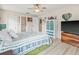 Another view of a bedroom showcasing closet space and an attached bathroom at 6188 80Th N St # 101, St Petersburg, FL 33709