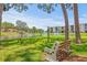 Scenic view of pond and lush landscaping surrounding condo community at 6188 80Th N St # 101, St Petersburg, FL 33709