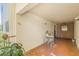 Inviting outdoor patio area with seating, creating a relaxing space with garden views for quiet enjoyment at 6188 80Th N St # 101, St Petersburg, FL 33709