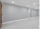 Bright living room with marble floors, recessed lighting, and neutral paint at 6309 7Th Ave, New Port Richey, FL 34653