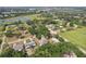 A high aerial view shows the home's location in relationship to the intercoastal waterway at 707 9Th Sw Ave, Ruskin, FL 33570