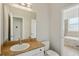 Bathroom featuring a single sink with access to shower/tub at 707 9Th Sw Ave, Ruskin, FL 33570