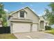 Charming home featuring a convenient two-car garage and well-maintained landscaping at 707 9Th Sw Ave, Ruskin, FL 33570