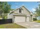 Charming home featuring a convenient two-car garage and well-maintained landscaping at 707 9Th Sw Ave, Ruskin, FL 33570