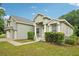 Charming home with a well-maintained lawn, attached two car garage, and an inviting front entrance at 707 9Th Sw Ave, Ruskin, FL 33570