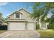 Charming home featuring a convenient two-car garage and well-maintained landscaping at 707 9Th Sw Ave, Ruskin, FL 33570