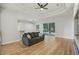 Comfortable living room with access to outdoor space and features neutral decor and ample natural light at 707 9Th Sw Ave, Ruskin, FL 33570