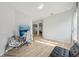 Spacious living room with wood-look flooring and plenty of natural light at 707 9Th Sw Ave, Ruskin, FL 33570