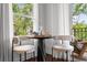 Cozy balcony setting with chess table and seating with views of lush landscape at 727 Coral Reef Dr, Tampa, FL 33602