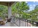 Enjoy the outdoors on this balcony with black metal railings and views of mature trees at 727 Coral Reef Dr, Tampa, FL 33602