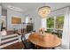 Cozy dining room features chandelier, natural light and offers a stylish space for meals at 727 Coral Reef Dr, Tampa, FL 33602