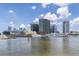 Beautiful water view of the channel, city buildings, and boats docked at the marina at 727 Coral Reef Dr, Tampa, FL 33602