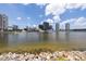 Enjoy waterfront living with spectacular water views, city buildings, and boats at 727 Coral Reef Dr, Tampa, FL 33602