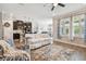 Spacious living area with an open layout, leading to the kitchen and dining spaces at 751 Cajeput Loop, Tarpon Springs, FL 34689