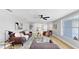 Inviting living room with wood floors and plenty of natural light at 829 Riverside Dr, Tarpon Springs, FL 34689