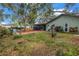 Spacious backyard with brick patio, perfect for outdoor entertaining and relaxation at 9611 107Th N Ave, Largo, FL 33773