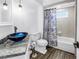 Stylish bathroom with vessel sink, granite countertop, and updated fixtures at 9611 107Th N Ave, Largo, FL 33773