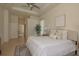 Comfortable bedroom featuring tray ceilings, neutral tones, and plenty of space at 987 Chickadee Dr, Venice, FL 34285
