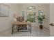Comfortable home office bathed in natural light with a calming and relaxing atmosphere at 987 Chickadee Dr, Venice, FL 34285